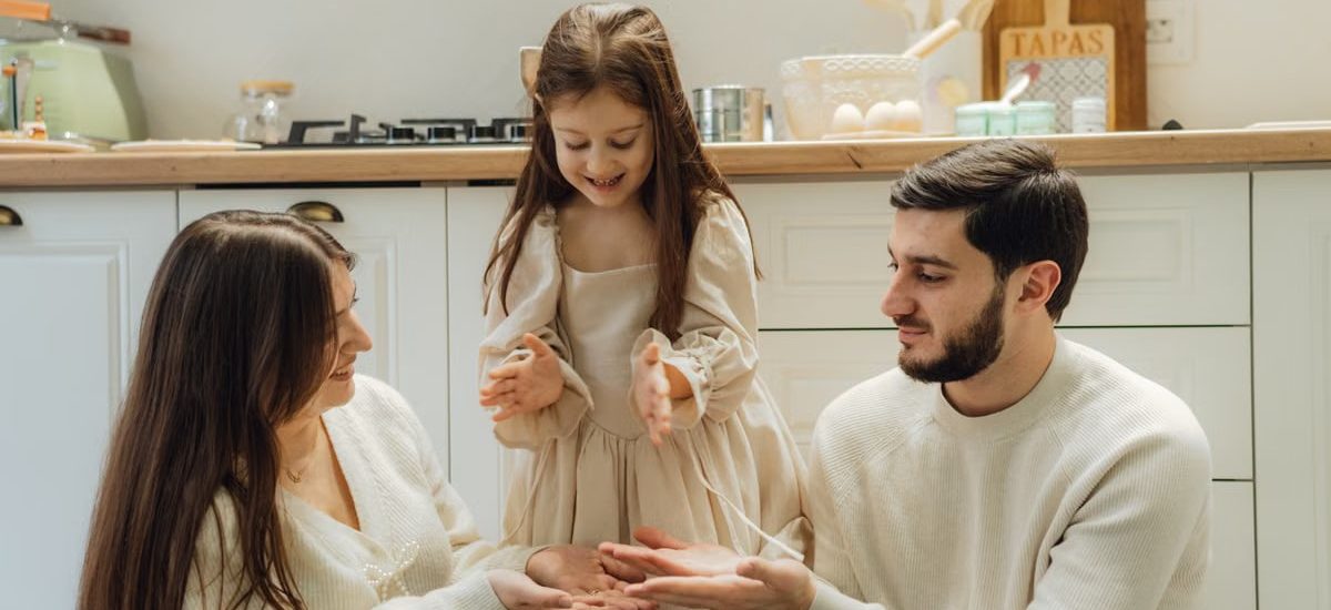 A cheerful family enjoying baking time in their cozy kitchen, fostering love and togetherness.